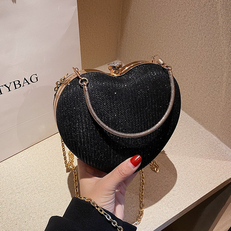 New Heart Chain Crossbody bag Explosion Handheld Peach Heart Bag Clutch for Women women fashion Orange Felix Black  
