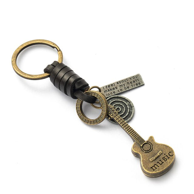 Classic keyboard guitar bike elephant shape series brass Copper keychains  hozanas4life K020120D 12 cm 